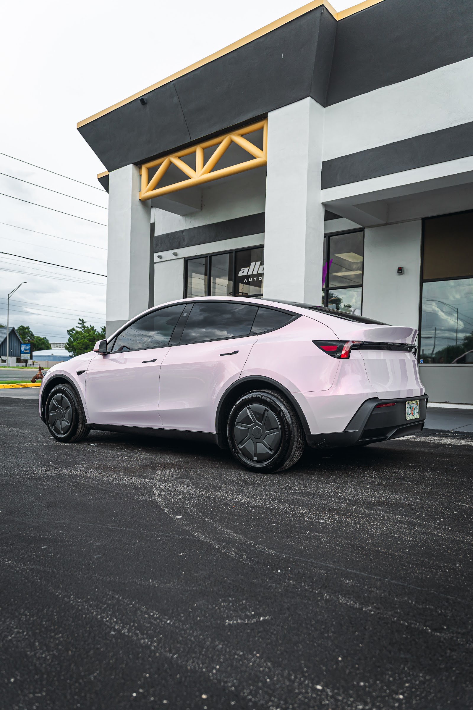 Tesla Model Y in Pearl Opal colored PPF by Allure Auto Spa, Winter Park FL