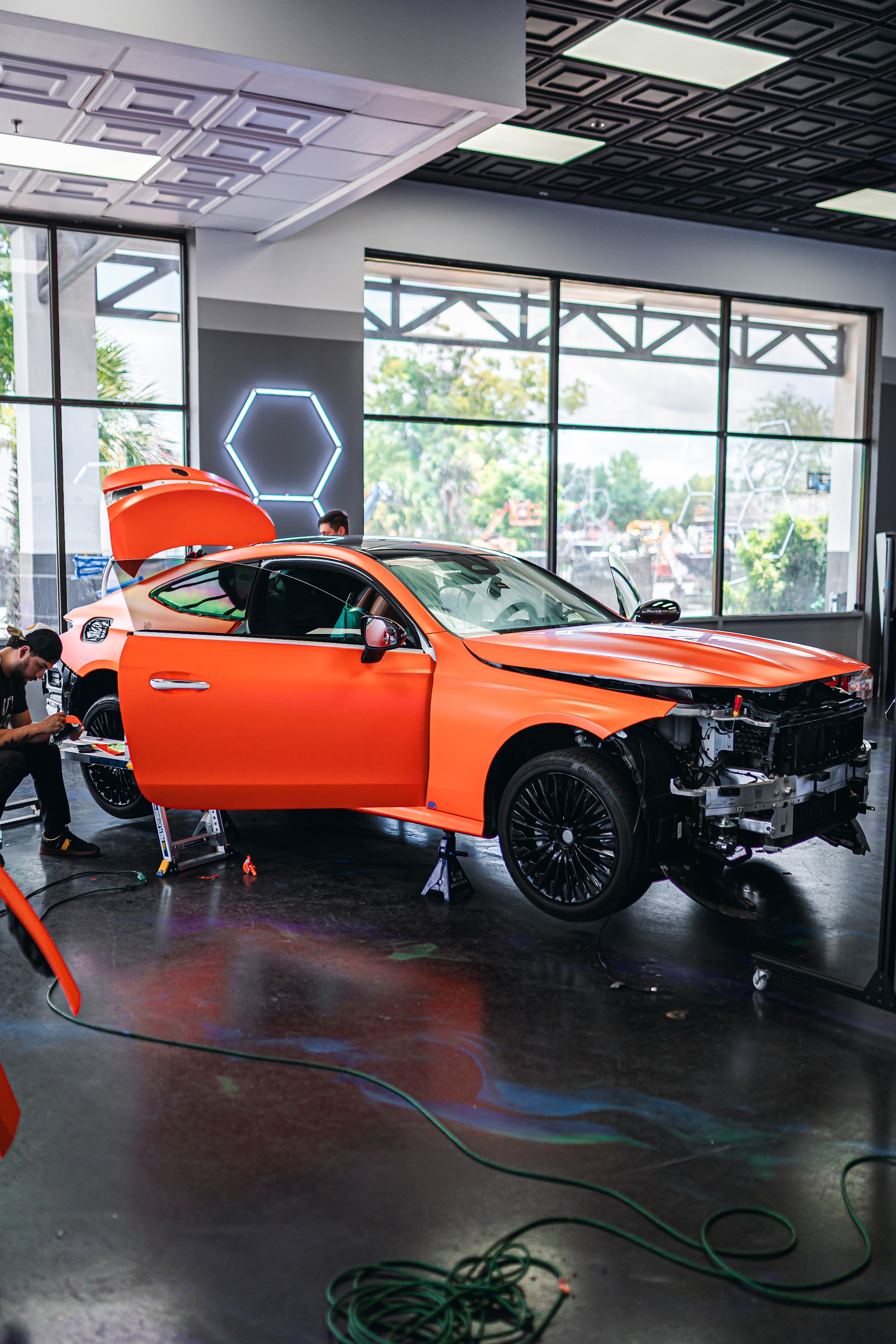 Orange McLaren detailed and paint-protected at Allure Auto Spa in Fern Park, FL