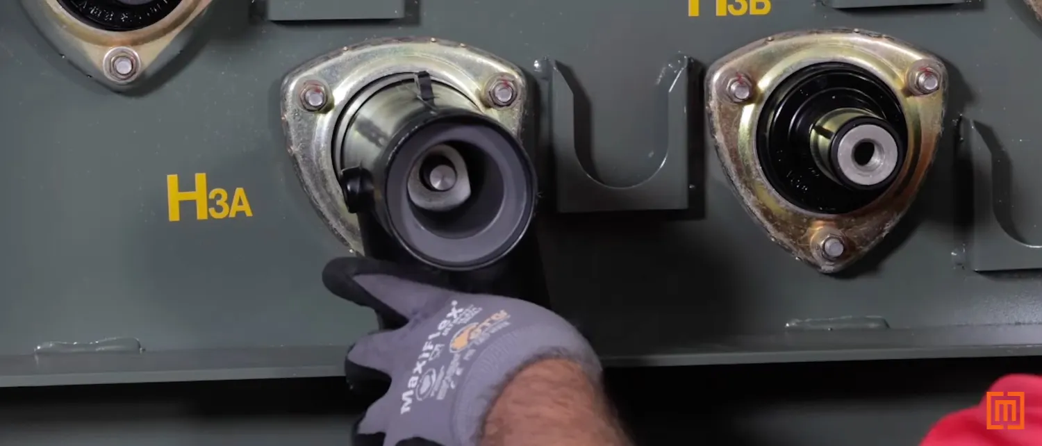 T-Body head placed on padmount bushing