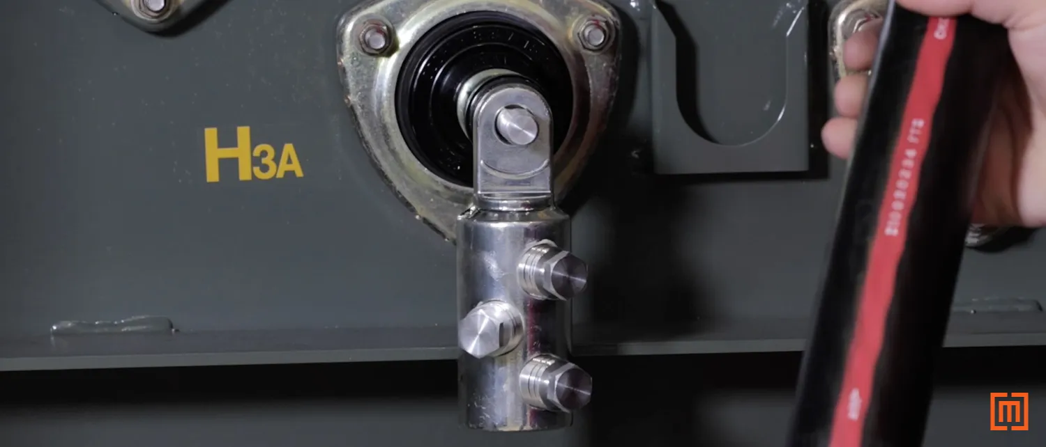 T-Body lug hung flat on a padmount bushing