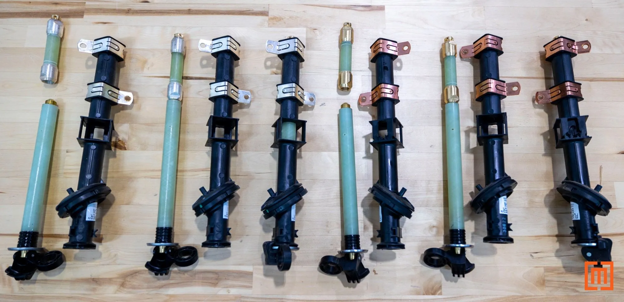 multiple transformer bayonet fuses on a table