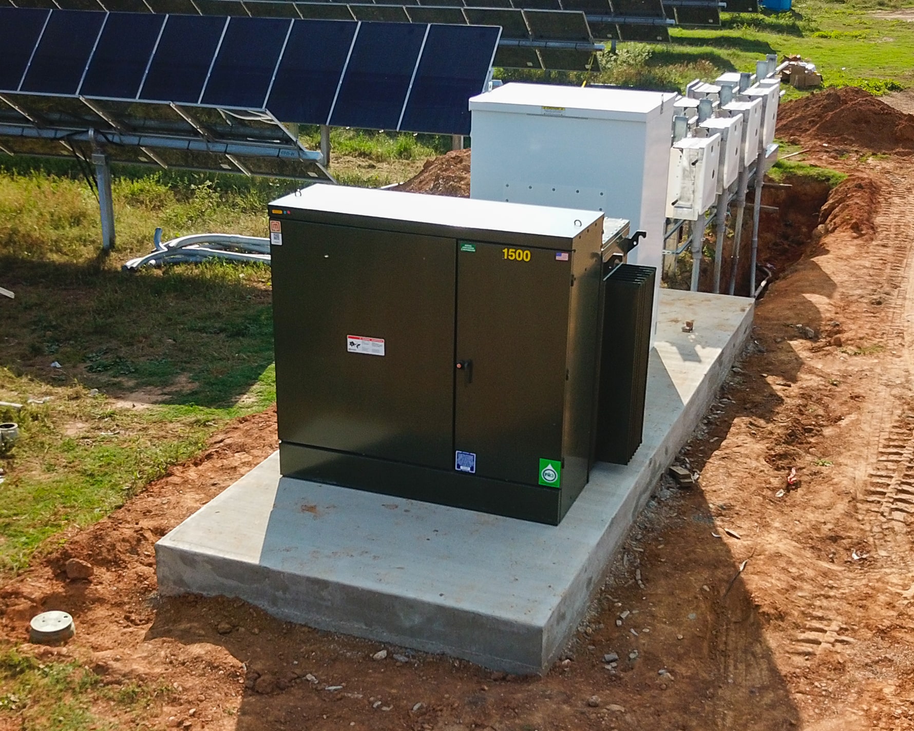 Wide shot of padmount transformer at solar farm project