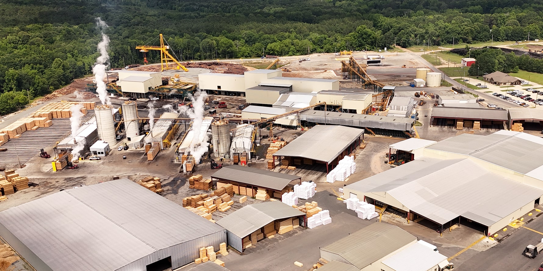lumber mill yard with padmount transformers