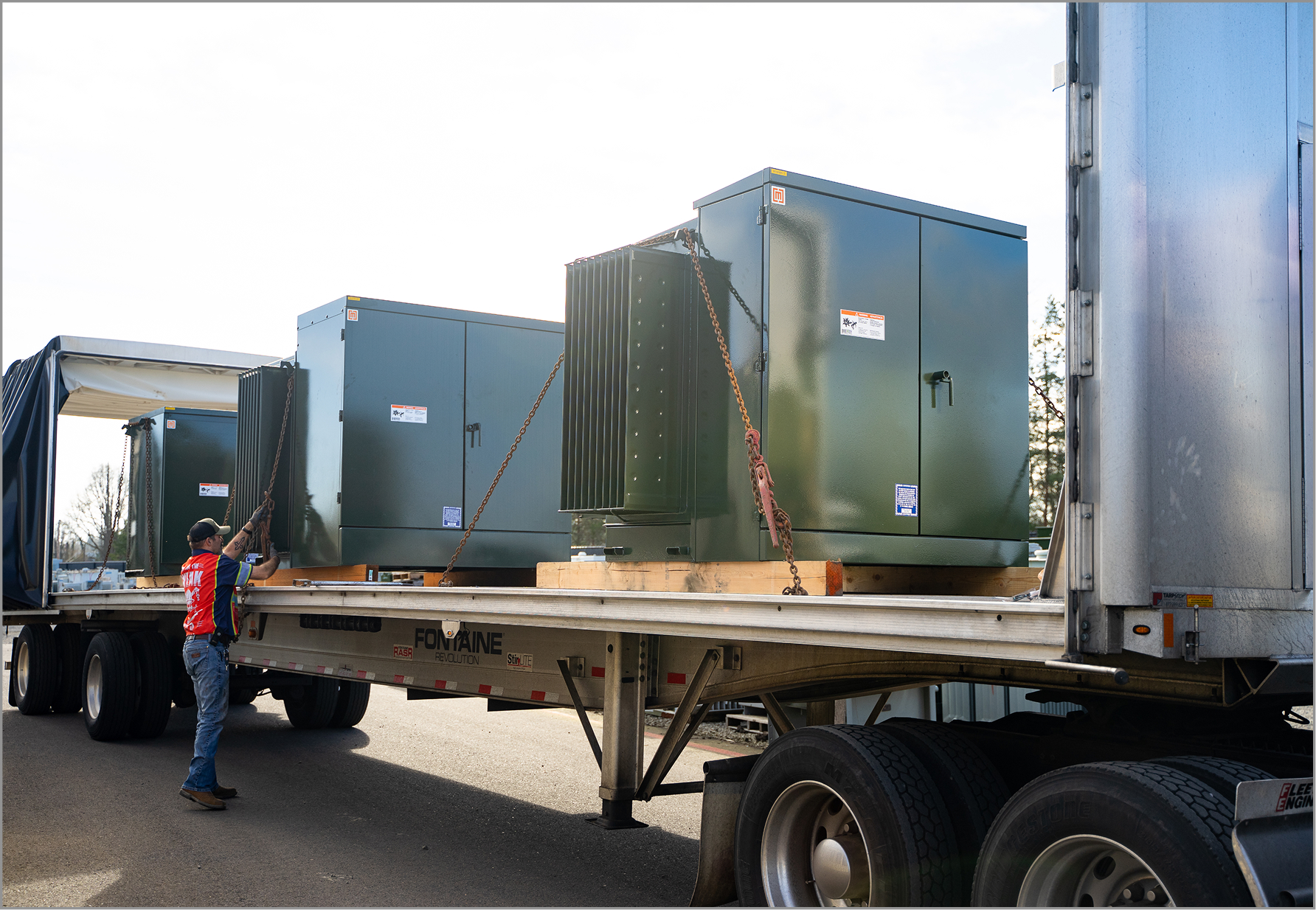 Loading padmount transformers onto truck for shipping