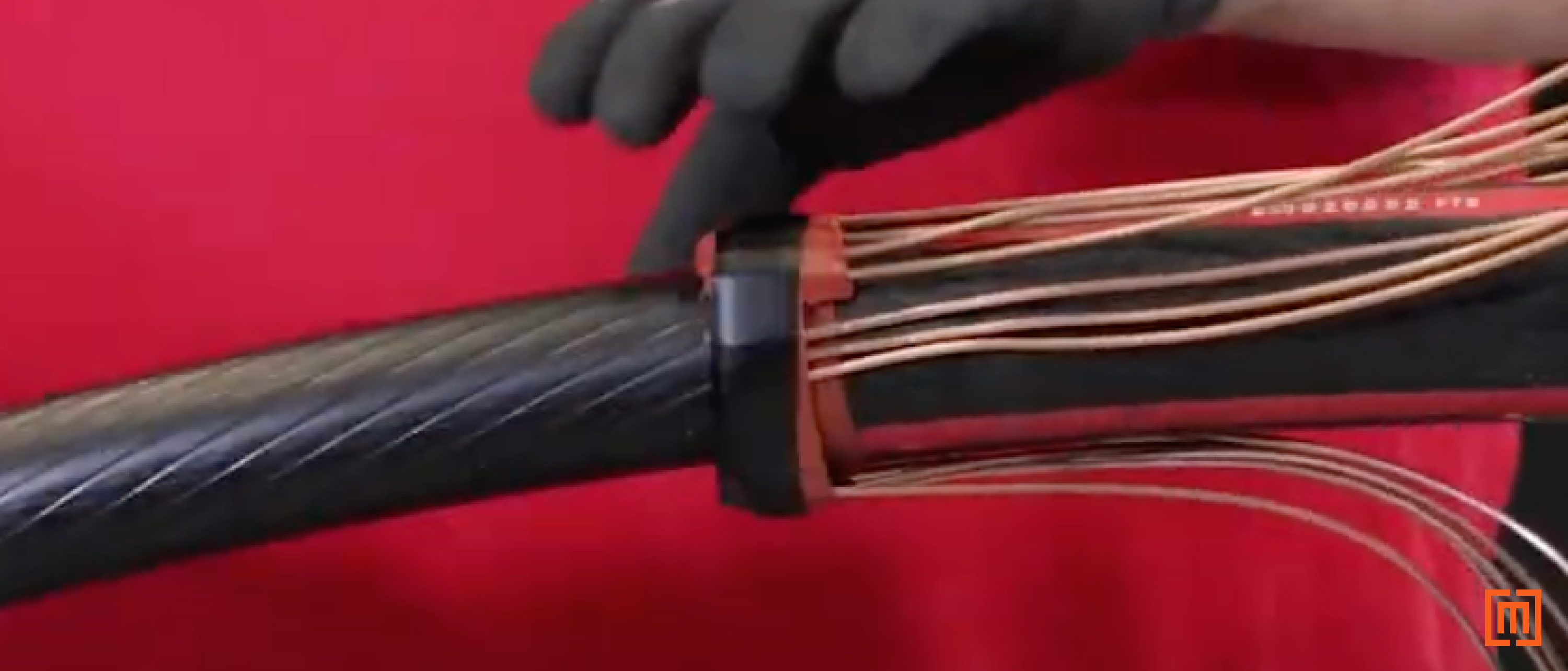 Technician covers mastic tape in a layer of electrical tape