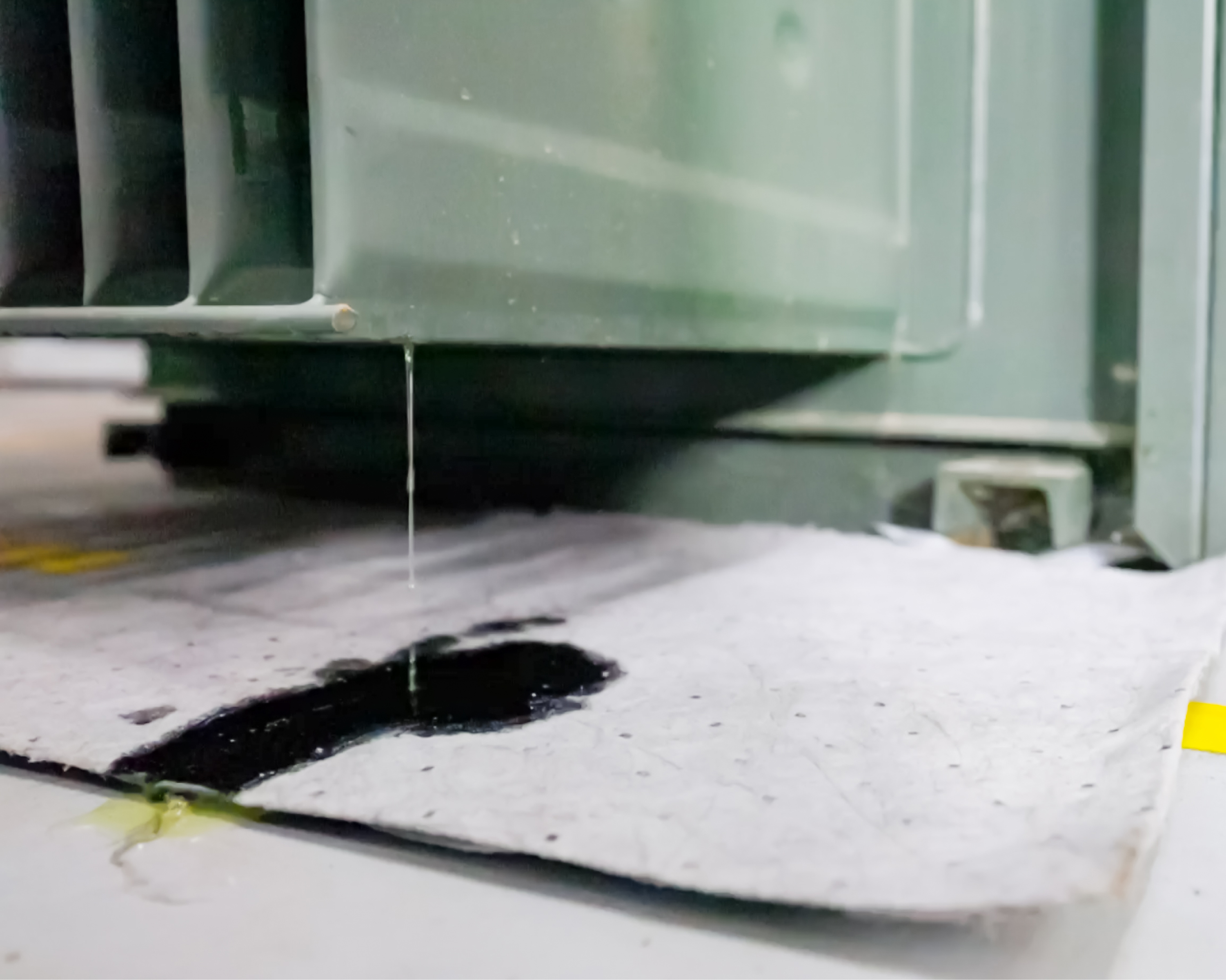 A transformer oil leak coming from a padmount transformer radiator fin.