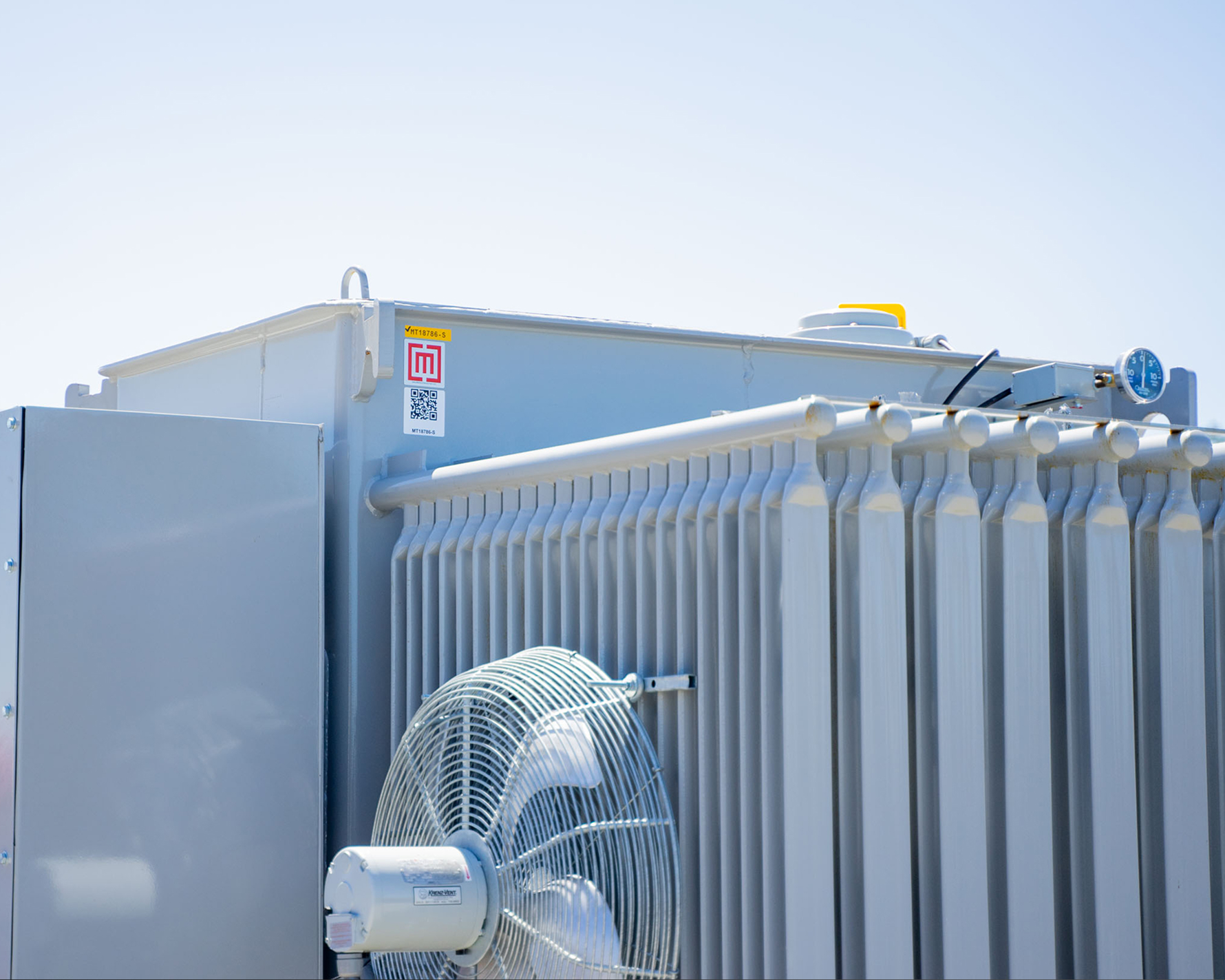 substation transformer with cooling fans in yard 