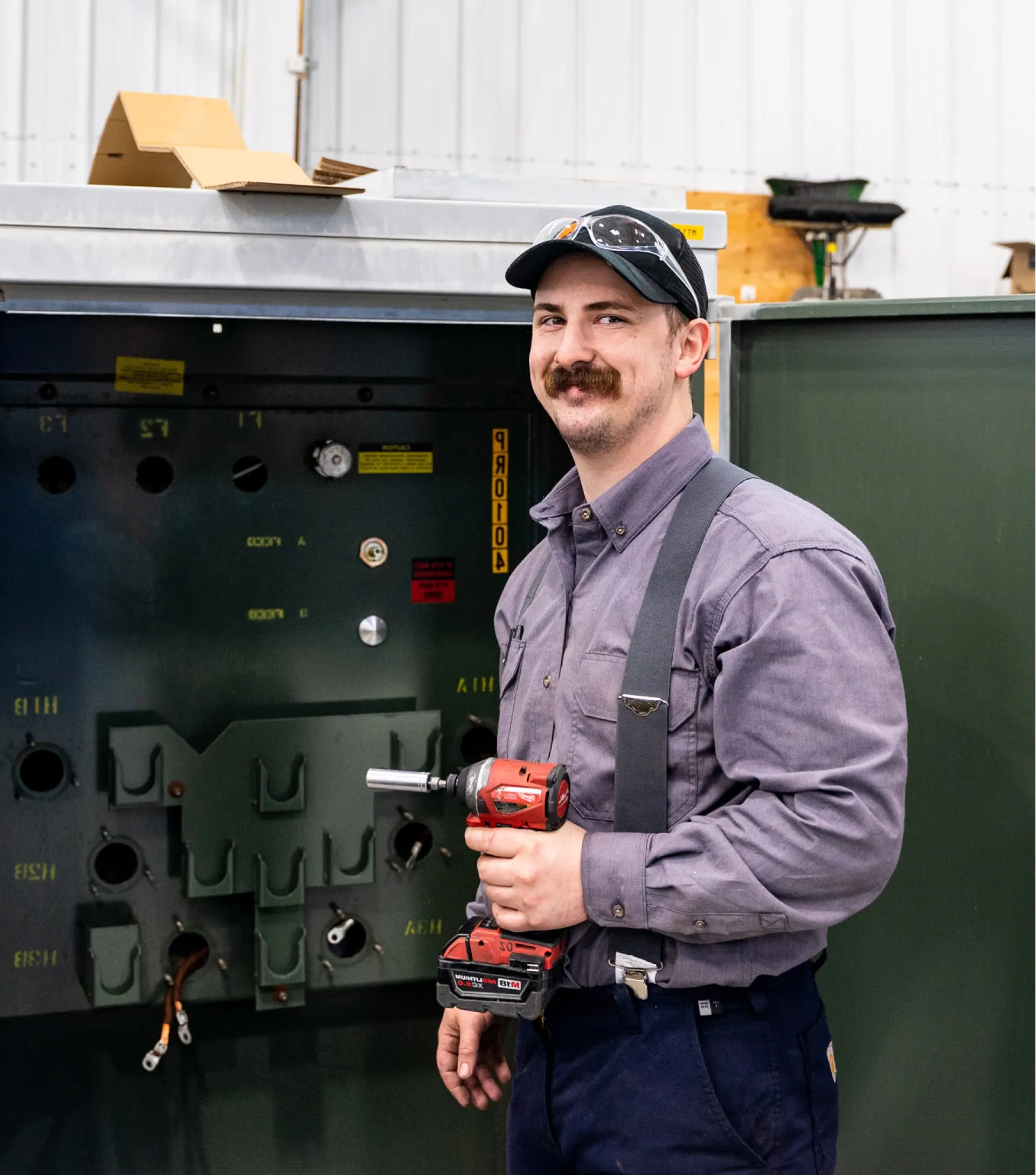 Maddox employee repairing a padmount transformer