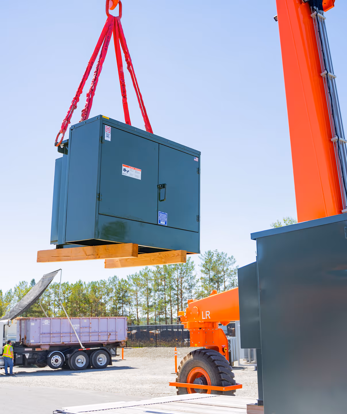 A padmount transformer outside a data center filled with fr3 fluid