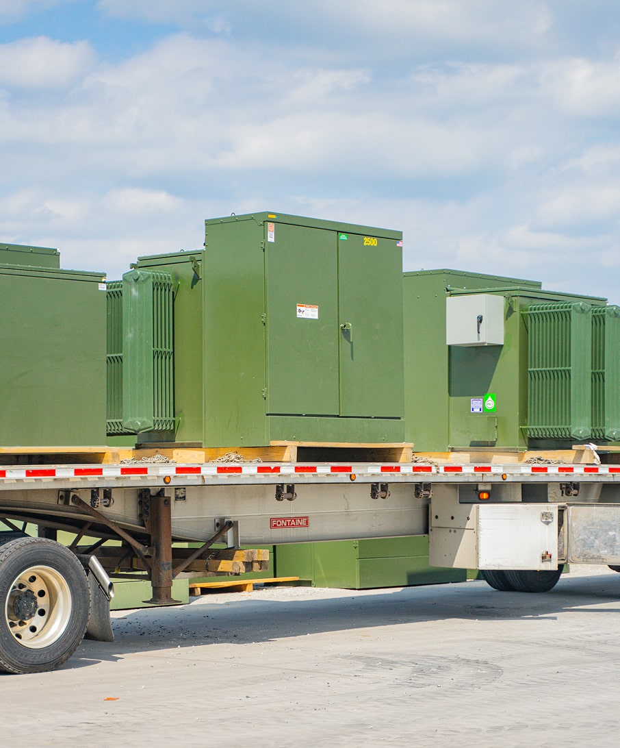 A padmount transformer outside a data center filled with fr3 fluid