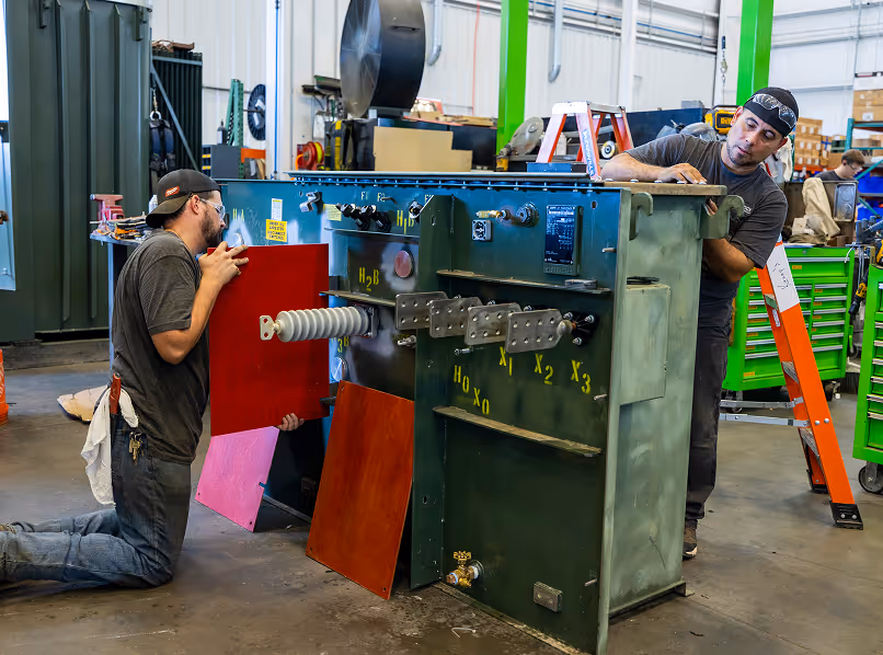 Maddox Transformer technicians remanufacturing a padmount transformer