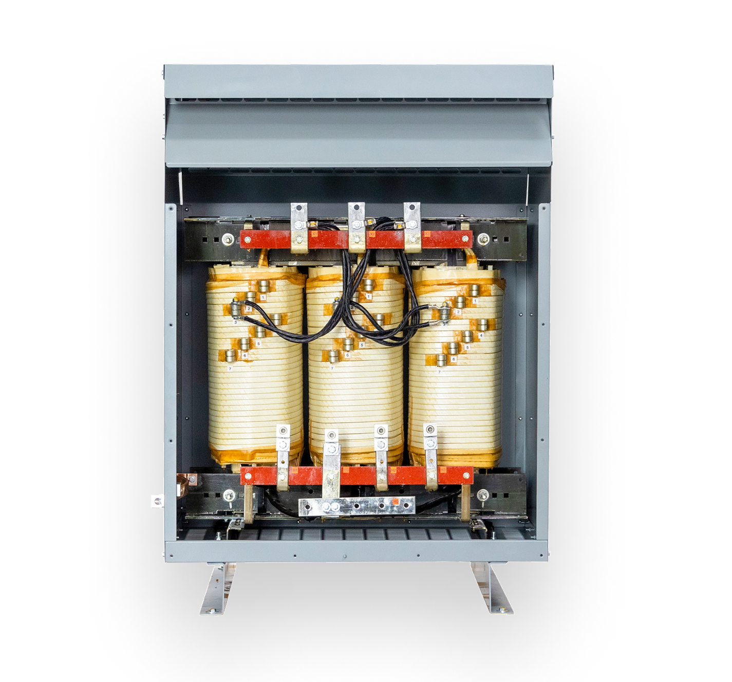 A Maddox low voltage dry-tpe transformer with the cover off showing the core and coils