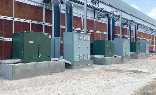 Three Maddox padmount transformers powering a bitcoin mining facility