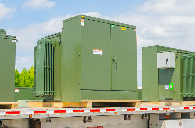 Maddox padmount transformers loaded on a flatbed trailer for delivery