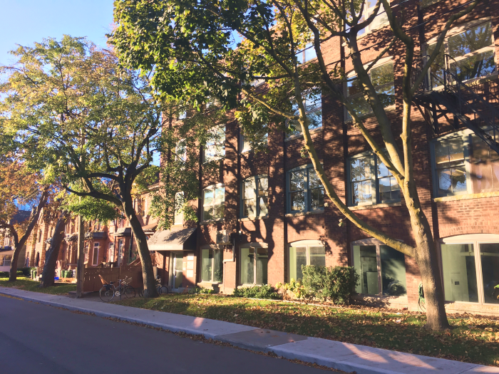 a brick office building on a sunny day