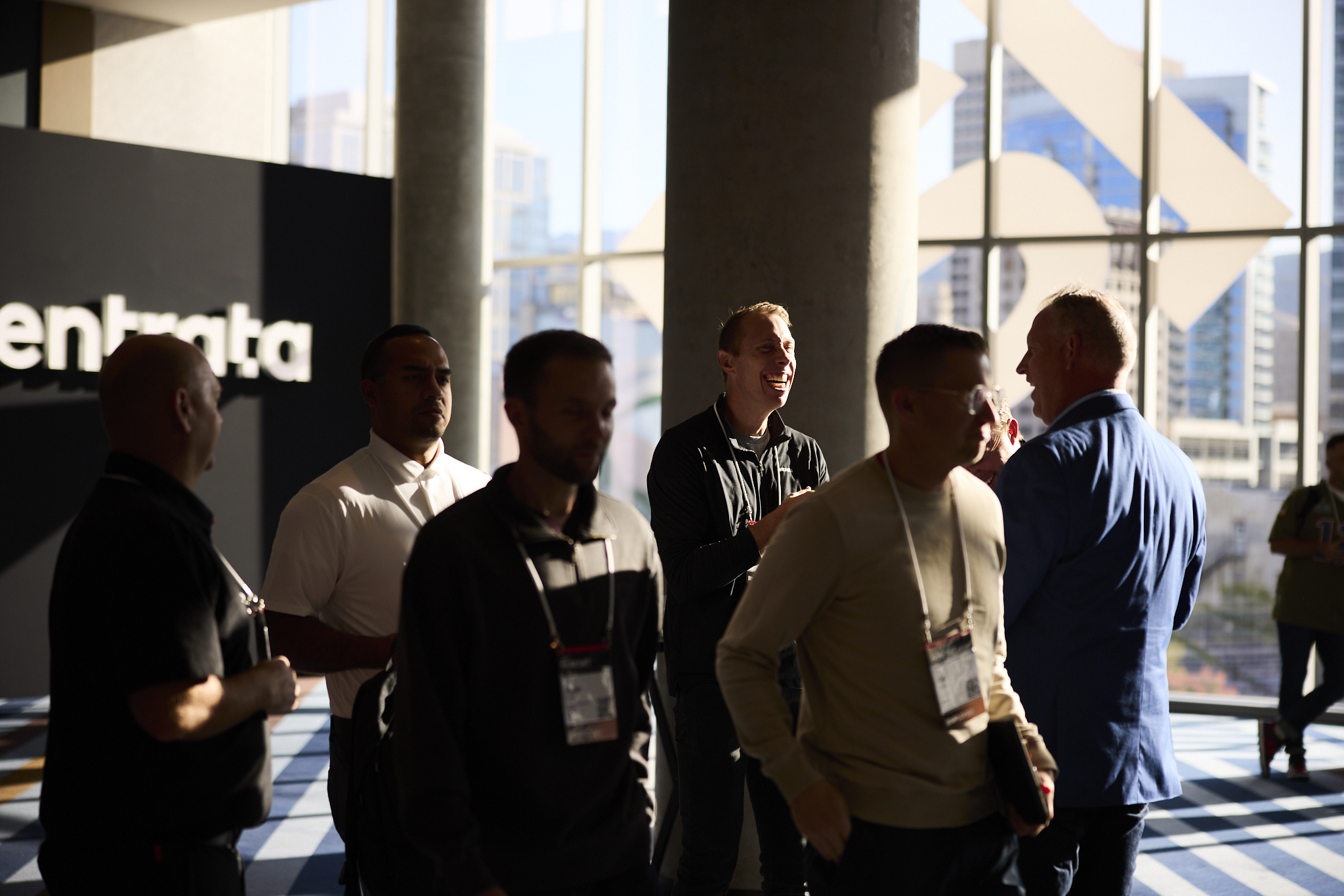 A candid of people walking in a hotel event area