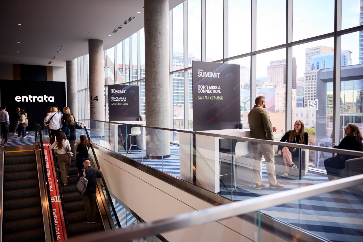 Shot of a hotel lobby with Entrata signs and natural sunlight