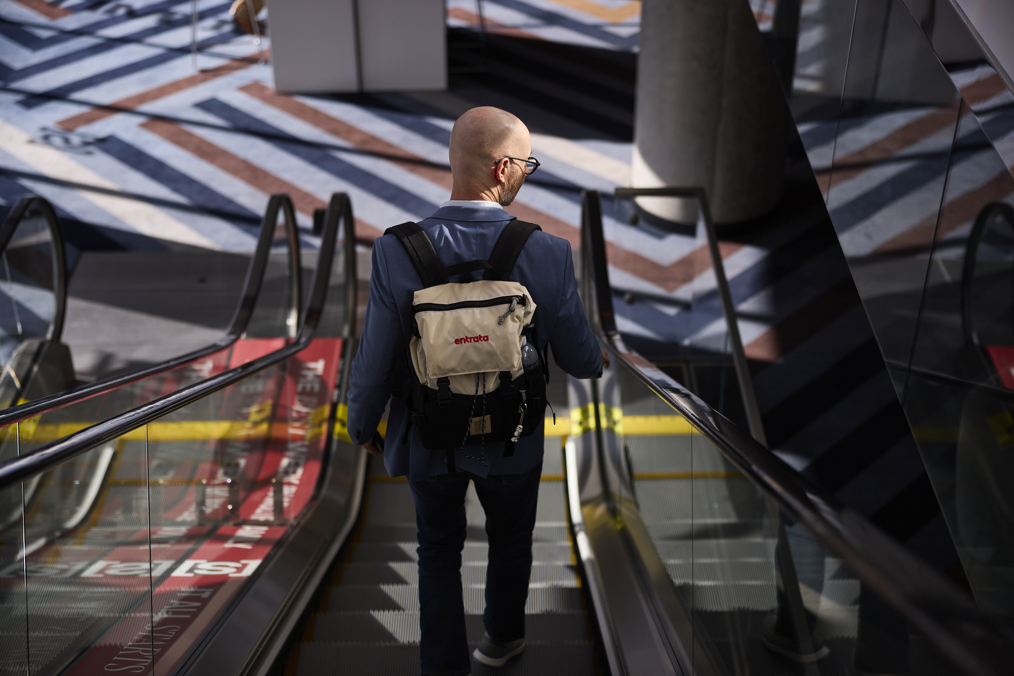 A person going down the escalator