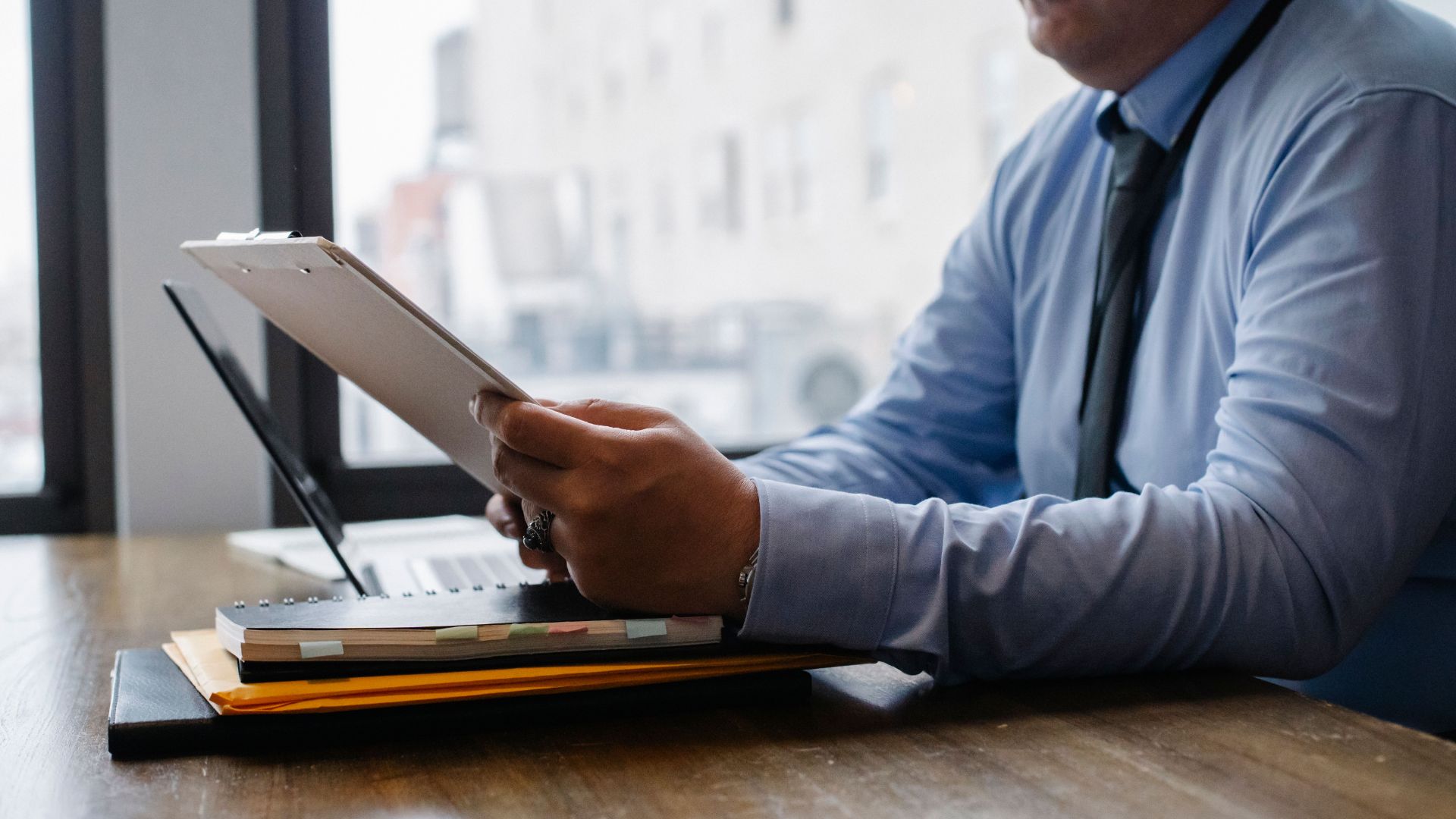 Property manager reviewing resident screening documents