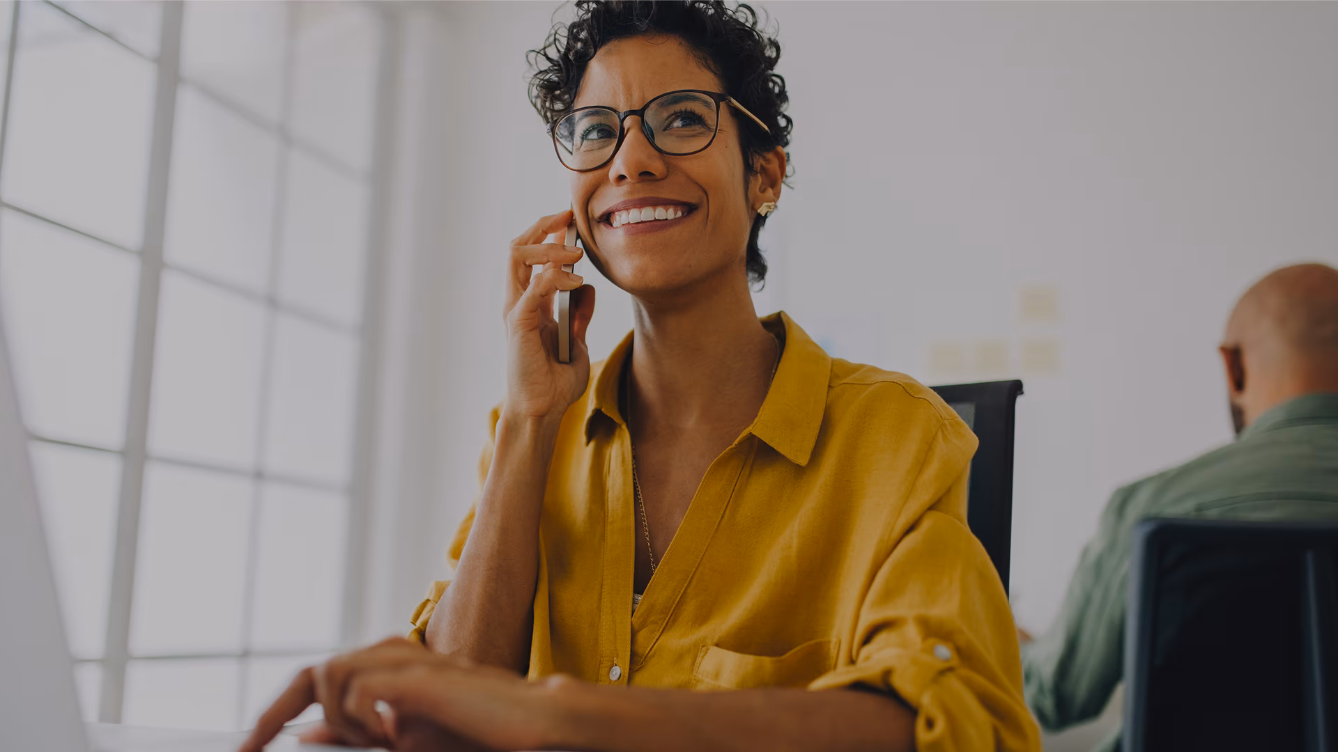 Woman on the phone and smiling