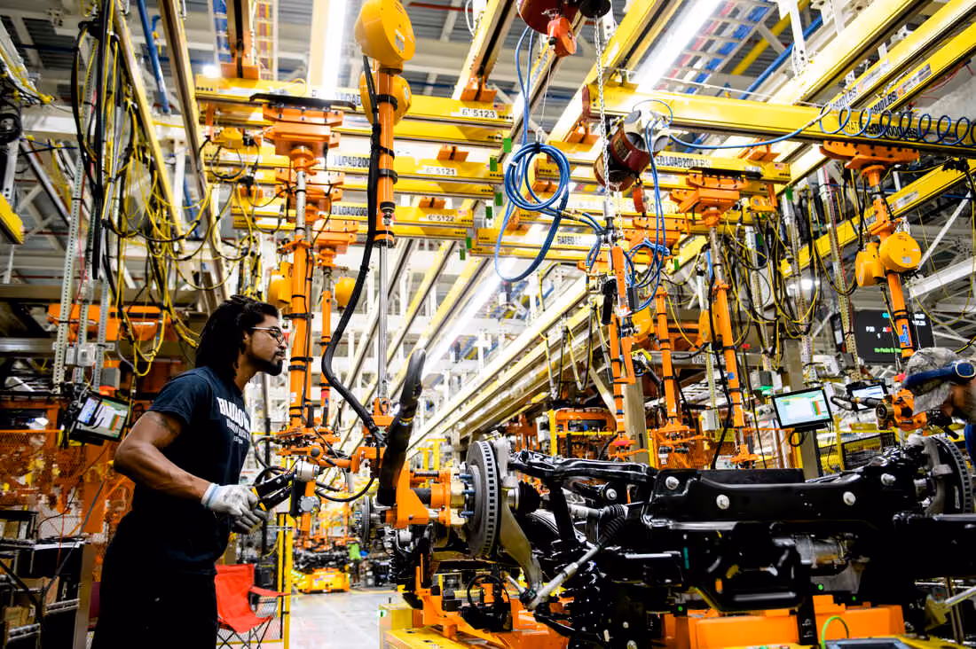A man working in an automotive warehouse