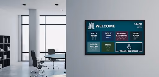 A digital screen on a wall in a white room