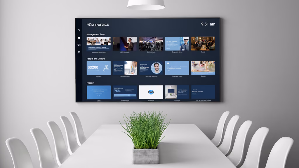 A digital screen on a wall in a office meeting room