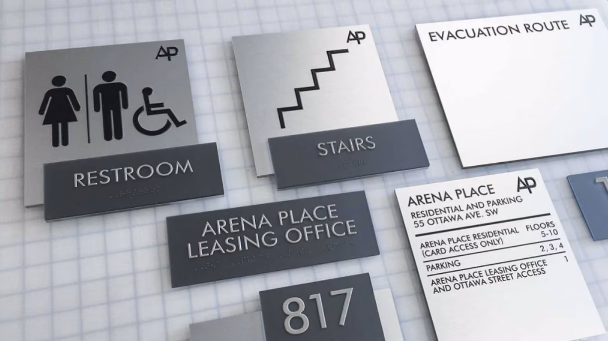 A wall displays a variety of colorful signs, showcasing different messages and designs.  