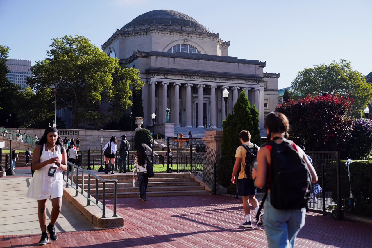 Students walking around a college campus