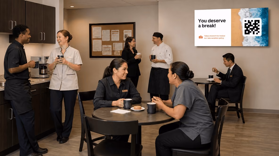 A group of people dining in a restaurant, with a QR code displayed prominently on the wall behind them. 