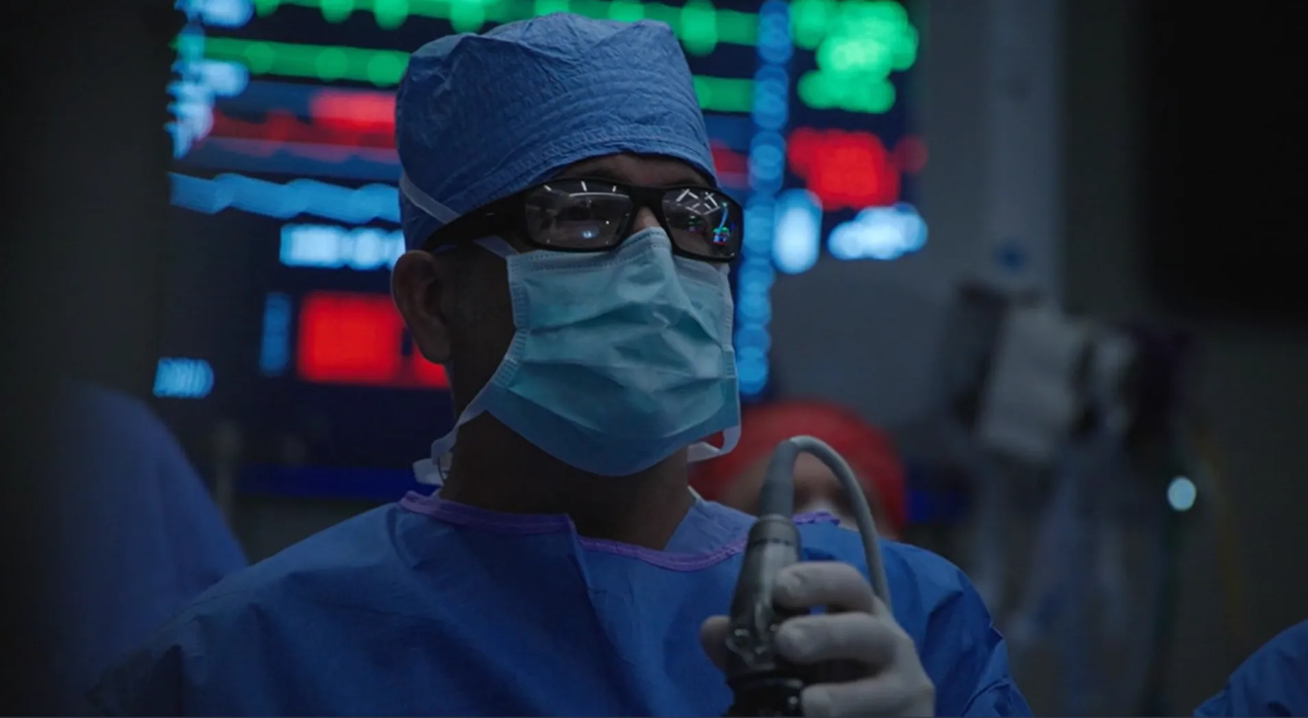 Surgeons using Cancer Illumination Imaging