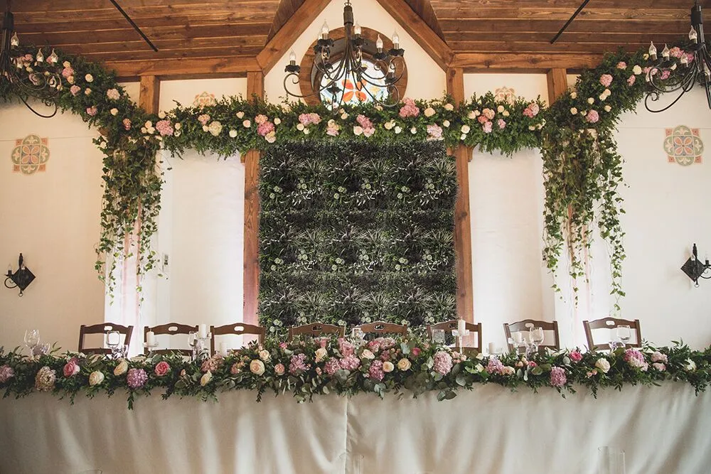Wedding venue with artificial green wall