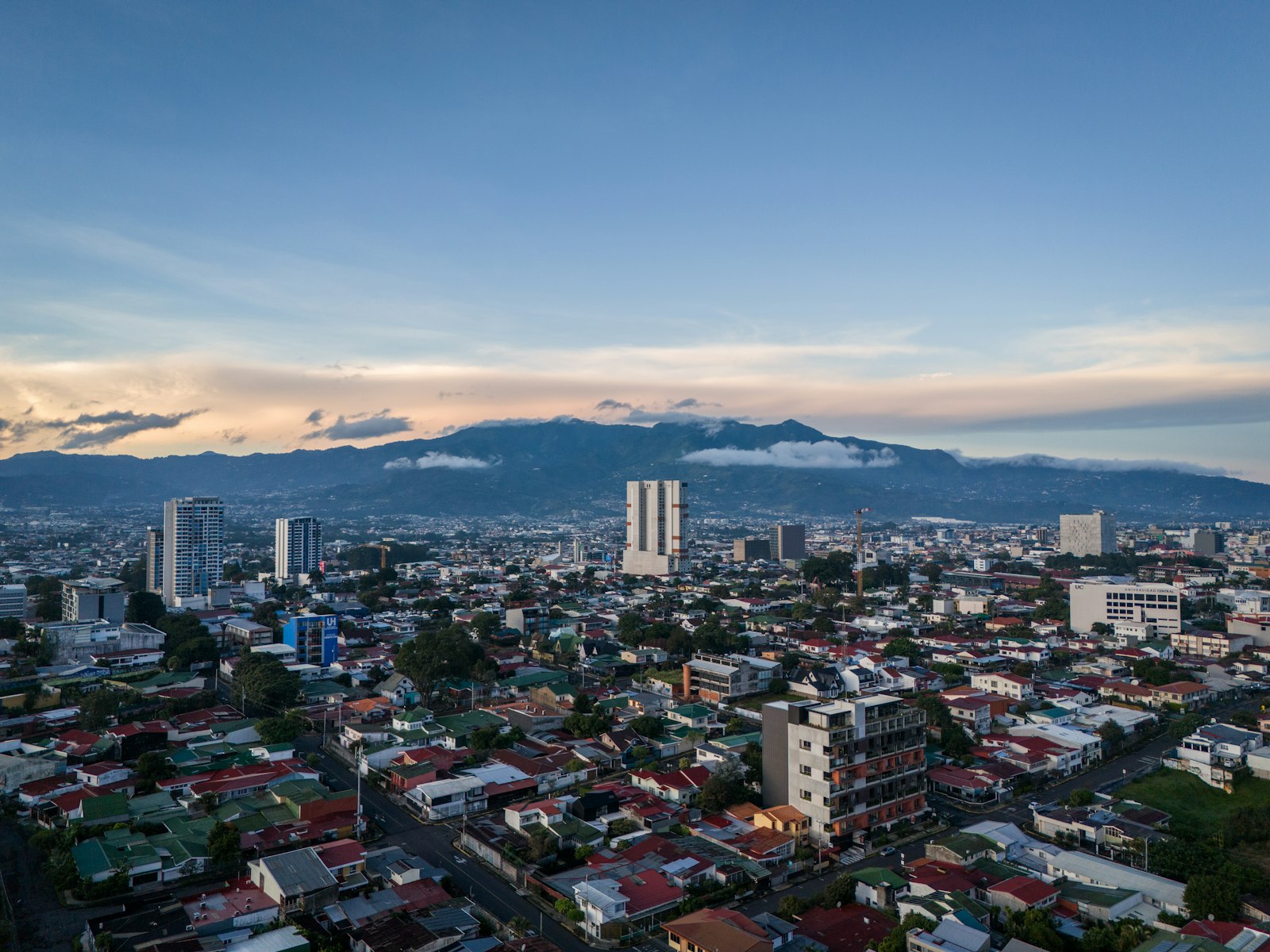 San José, Costa Rica cityscape with mountains rising in the background