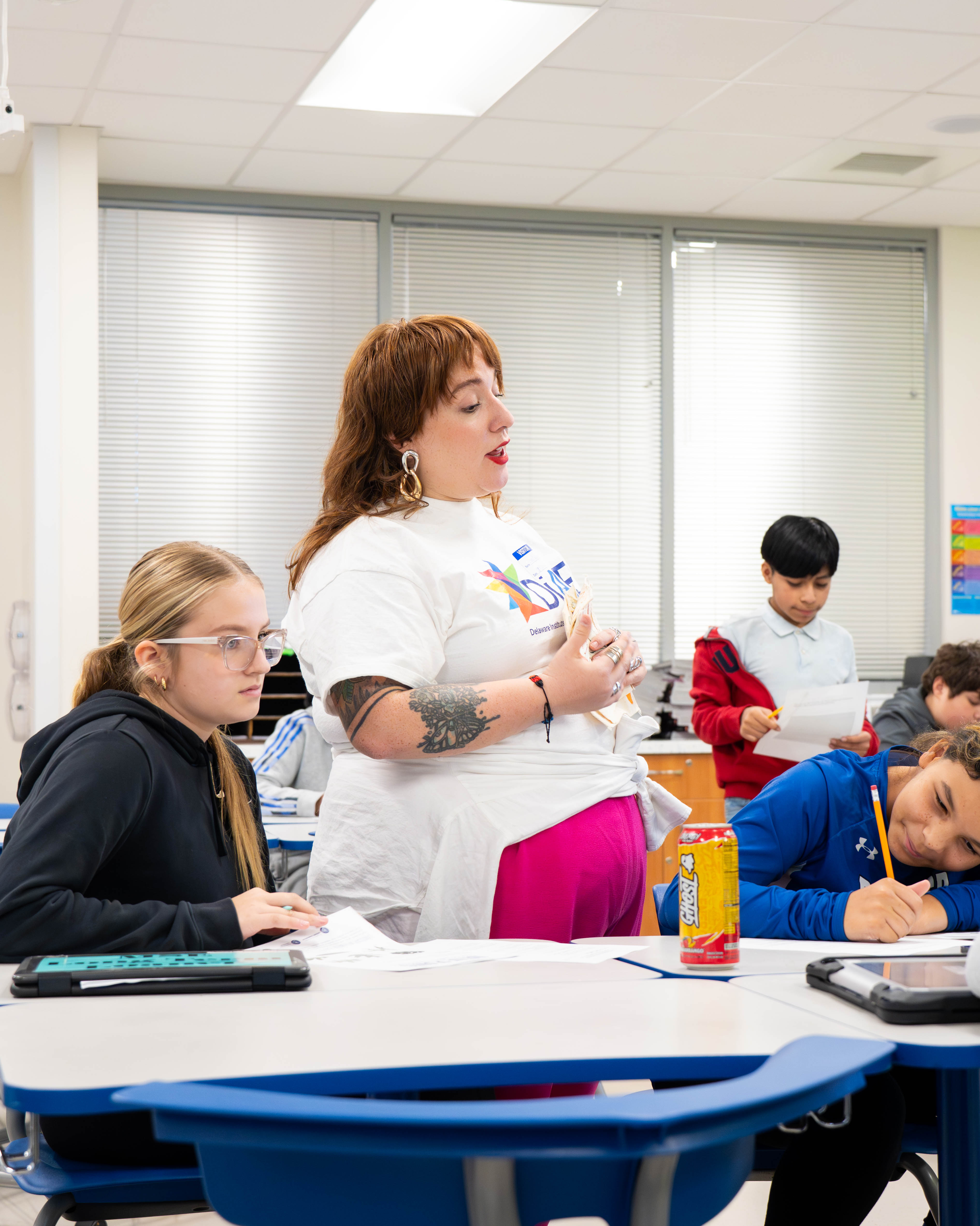 At Dover Middle School, DiAE brought in two teaching artists whose work created completely different, yet equally inspiring, learning environments. In the music and percussion residency, Jason guided students through rhythm, movement, and emotional expression. His sessions showed how music can help students communicate in ways beyond words—using beats, patterns, and collaboration to build confidence and connection. Across the hall, Cony led a Spanish-language residency rooted in visual art and Delaware state history. Her class blended language learning with creativity, inviting students to use illustration and storytelling to deepen their understanding of cultural identity and place. These photographs highlight the heart of DiAE’s mission—artists empowering students to learn through the arts, and classrooms transformed by imagination, curiosity, and joy.