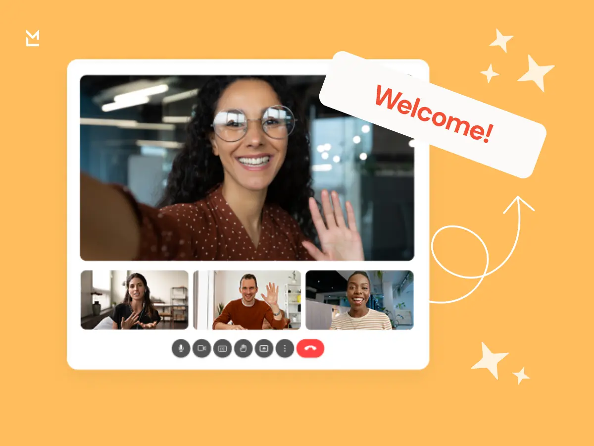 Smiling team on video call saying ‘Welcome!’ — remote onboarding with positive company culture.