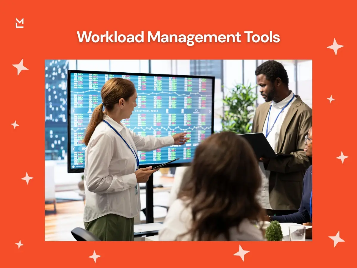 Team reviewing workload management tools and analytics dashboard during meeting