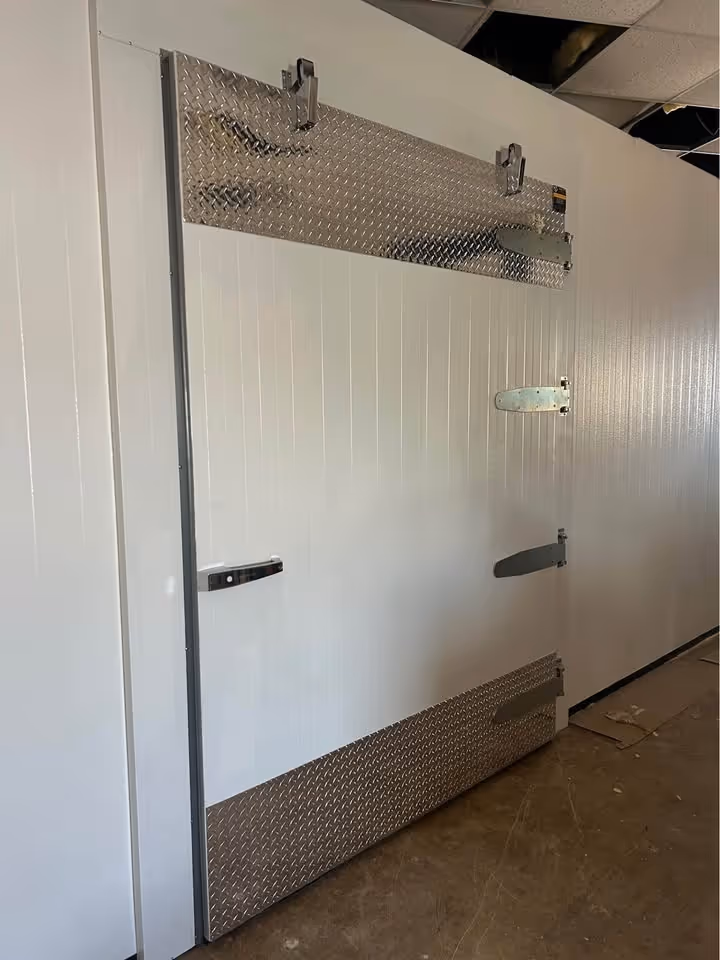 Oversized walk-in door installation