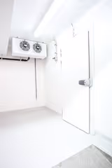 Commercial freezer for meat processing facility