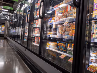 Glass display doors for supermarket frozen food section