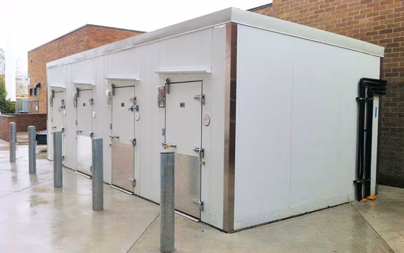Outdoor walk-in cooler with multiple doors