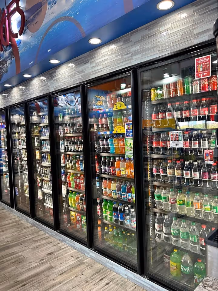 Reach-in glass display doors in convenience store cooler
