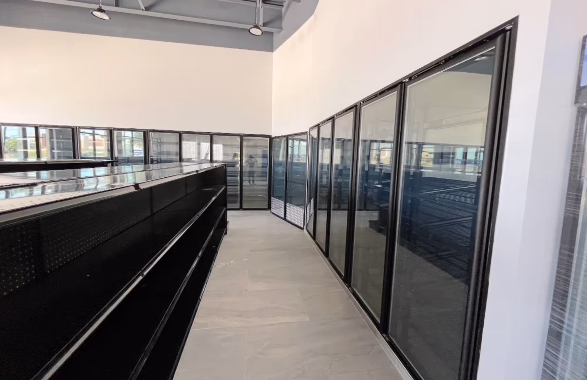 Grocery store glass display cooler doors