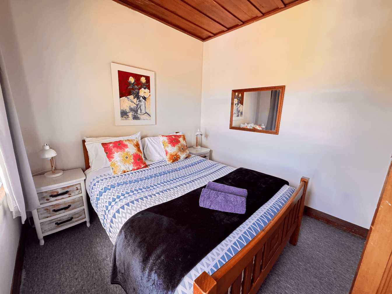 Smaller second bedroom at Harris Hideaway, a 2-bedroom holiday house in Gisborne. Operated by Accomnmodation in Gisborne