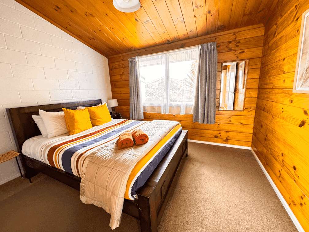 Accommodation in Gisborne Rutene Road Retreat 1 bedroom house, photo is of larger bedroom