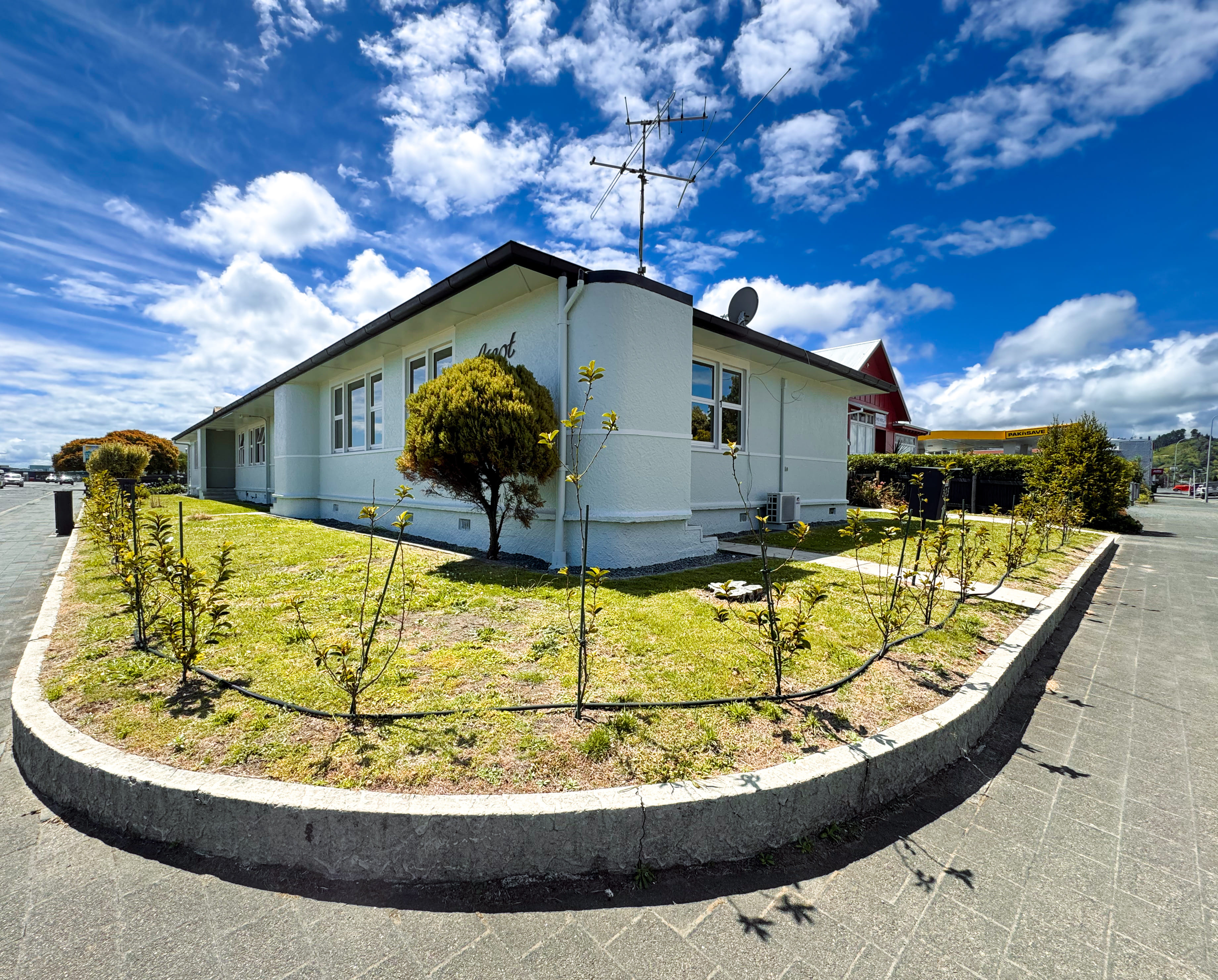 Front exterior view of The Ascot Flats, featuring four separate 2-bedroom holiday flats in Gisborne by Accommodation in Gisborne.