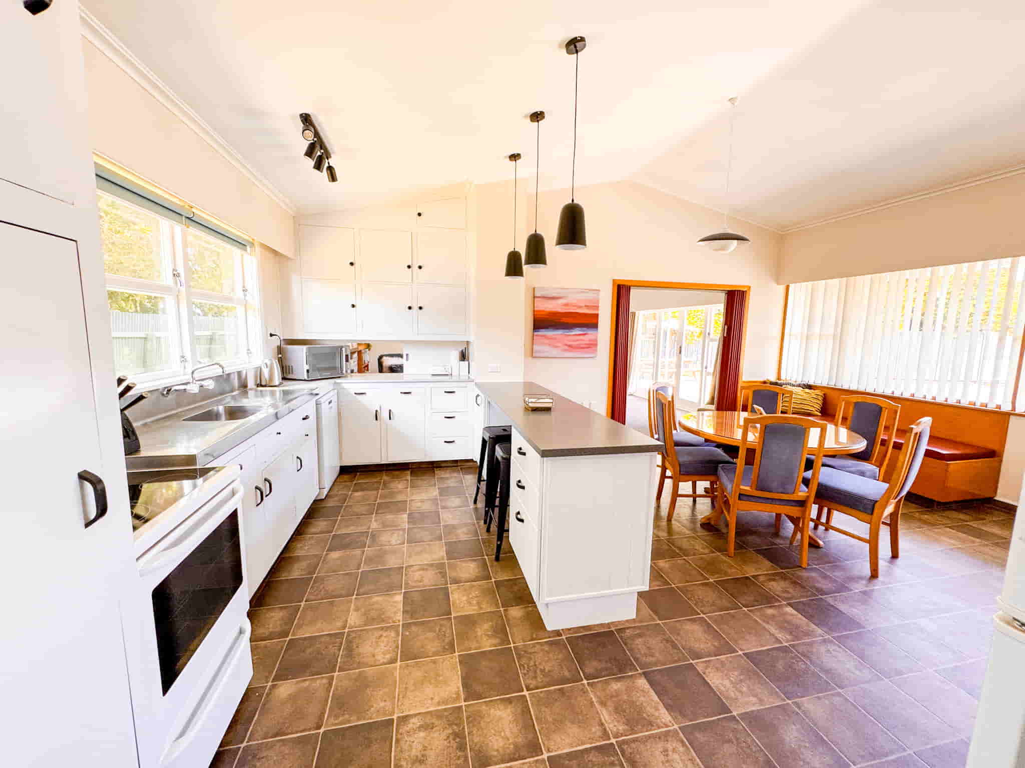 Kitchen and Dinning area at our 3 bedroom holiday house in Gisborne. Operated by Accomnmodation in Gisborne