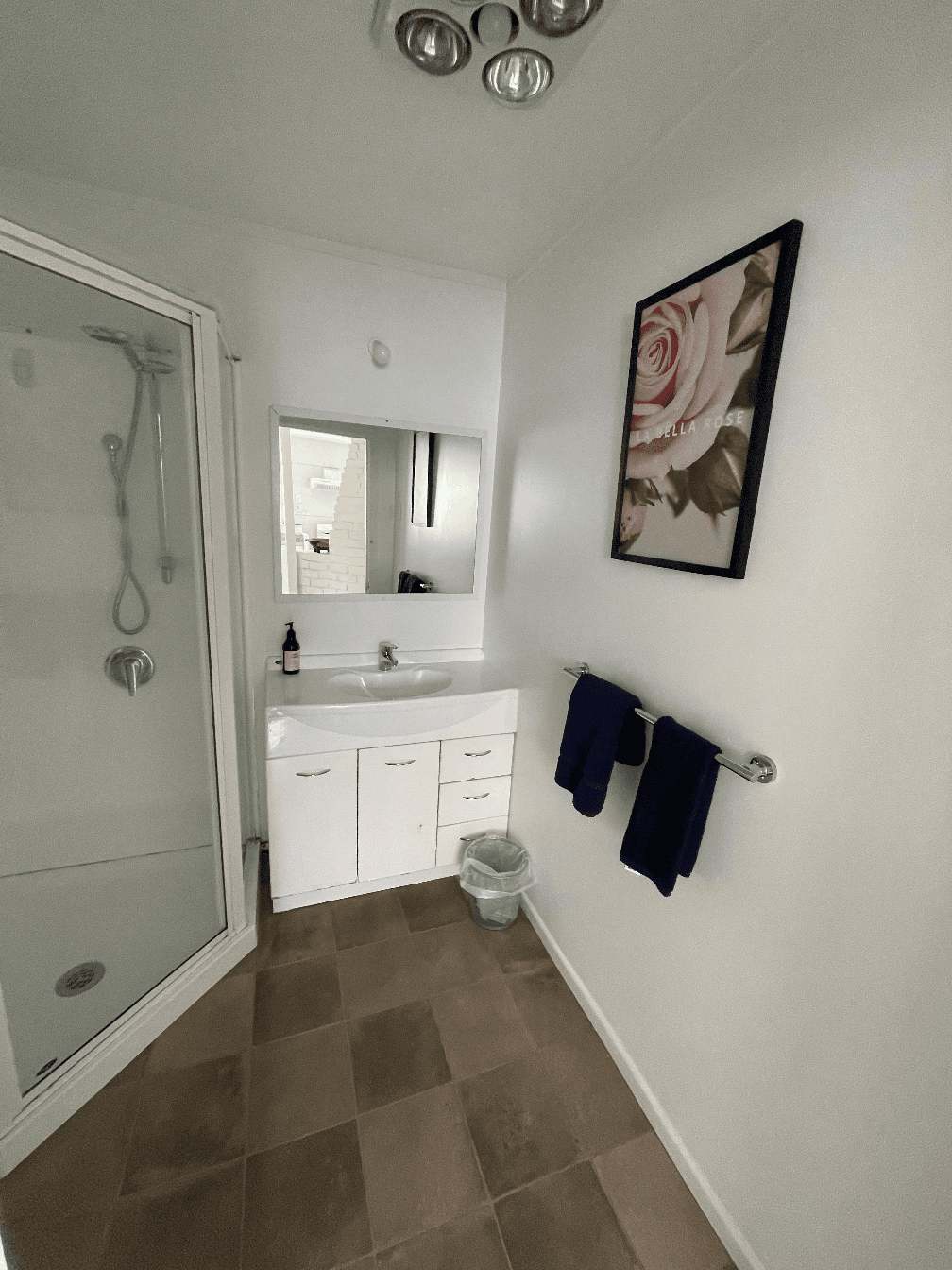 Shows shower, vanity, located near bedroom 3 at Stafford Stays