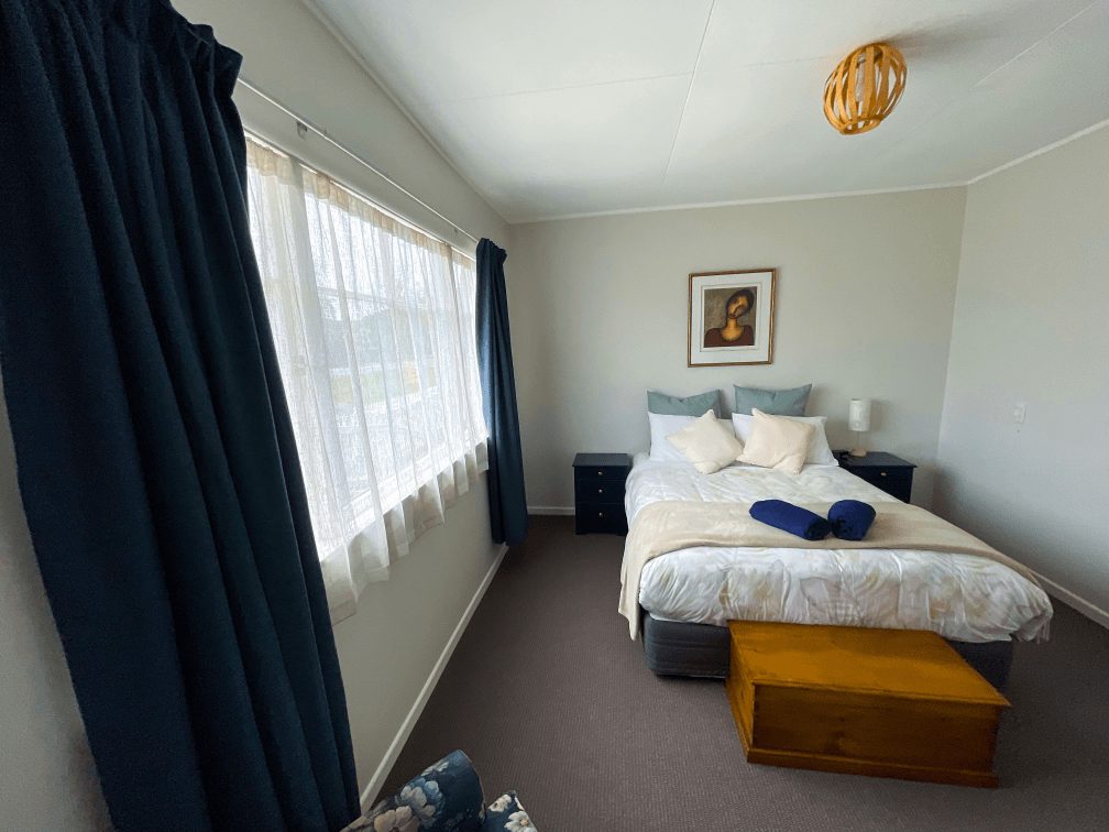 Accommodation in Gisborne Stafford Stays 3 bedroom house, photo is of front bedroom 1, largest room of the house