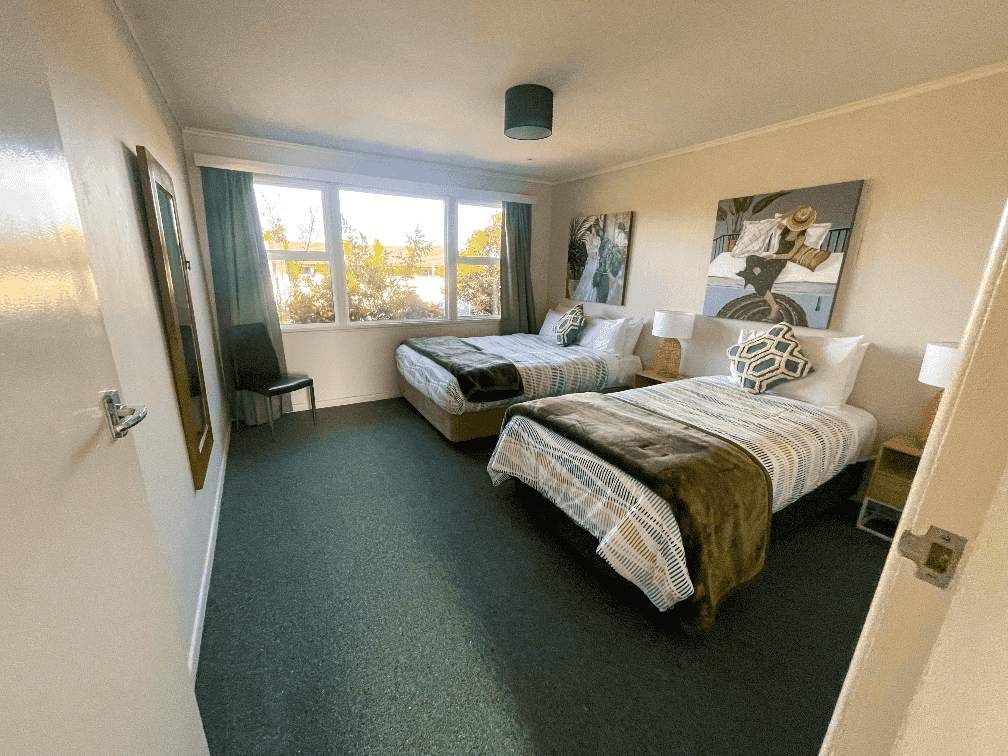 Ascot Apartments flat 1 325 photo of bedroom, queen bed, single bed, sofa bed