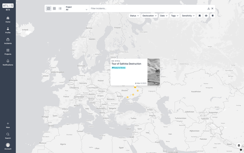 A screenshot of the Atlos platform UI showing a map of Ukraine and an open incident card displaying the text "Tour of Saltivka Destruction"